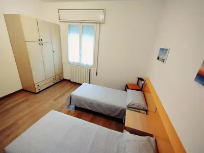Letto o letti in una camera di Villa Rosa