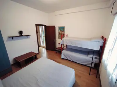 Letto o letti in una camera di Villa Rosa