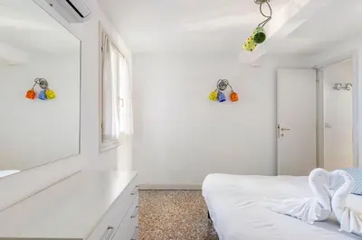 Letto o letti in una camera di Maison del Calice-iHOMES