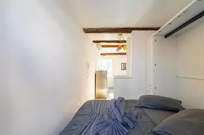 Letto o letti in una camera di Residenza del Calice-Attico con Terrazza-iHOMES