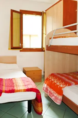 Letto o letti in una camera di Apartment Solmare-14 by Interhome