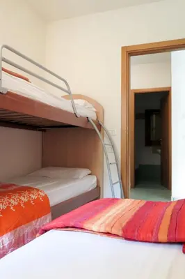 Letto o letti in una camera di Apartment Solmare-12 by Interhome