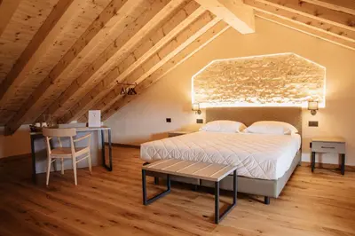 Letto o letti in una camera di Ca'Lisel