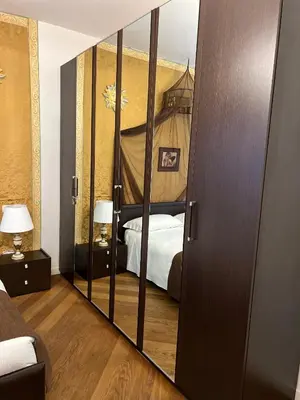Letto o letti in una camera di CasaBella