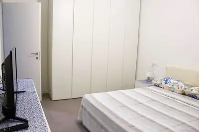 Letto o letti in una camera di WEST BEACH 2 JESOLO