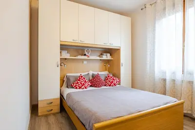 Letto o letti in una camera di Lovely House Claudia-perfetto per Venezia