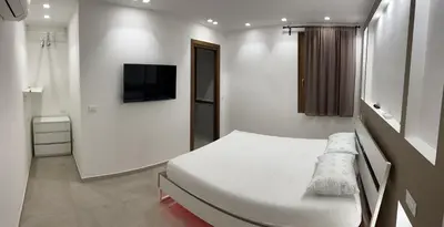 Letto o letti in una camera di Villa Mirella