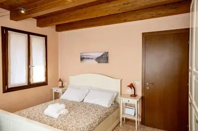 Letto o letti in una camera di Ca' Tintoretto
