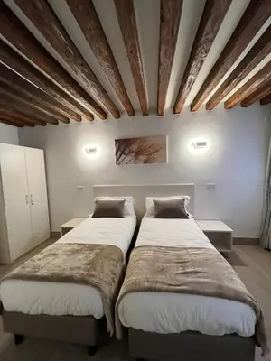 Letto o letti in una camera di Ca’ Briani