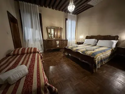 Letto o letti in una camera di 1 Ramo Grimani
