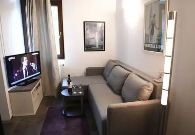 TV o dispositivi per l'intrattenimento presso Grace Apartment in Venice