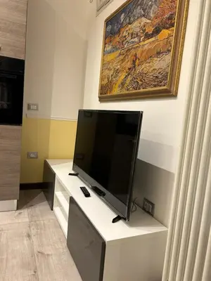 TV o dispositivi per l'intrattenimento presso Larocca Tourist Home 1