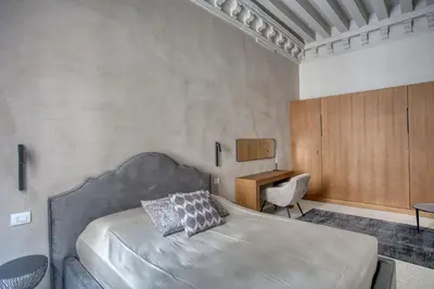 Letto o letti in una camera di Palazzo Bonvicini 10
