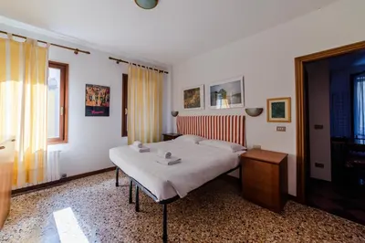 Letto o letti in una camera di Ca' Muneghe, spazioso e luminoso