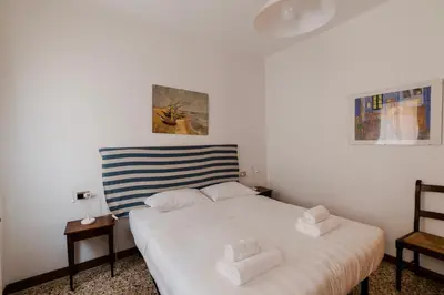 Letto o letti in una camera di Ca' Muneghe, spazioso e luminoso