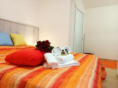 Letto o letti in una camera di Arcobaleno Room Venezia-Mestre