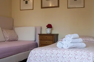 Letto o letti in una camera di COUNTRY HOUSE CASAMIRIAM