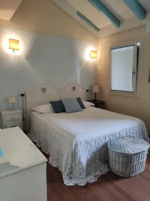 Letto o letti in una camera di COUNTRY HOUSE CASAMIRIAM