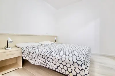 Letto o letti in una camera di Residence Apollo - Home Immobiliare Jesolo