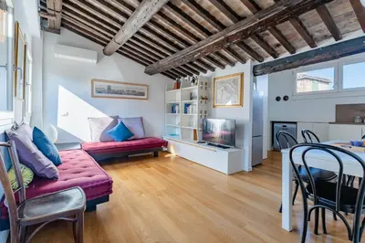 Area soggiorno di San Marco vista sui tetti veneziani Apartment