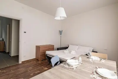 Letto o letti in una camera di San Vincenzo Apartments 1 - 2 - 4 Vigonza