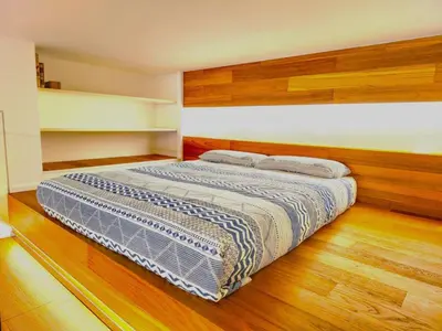 Letto o letti in una camera di APPARTAMENTO INCANTEVOLE A DUE PASSI DAL MARE