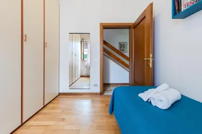 Letto o letti in una camera di Gate1-MarcoPoloAirport-3 Camere da letto-Wifi-Netflix-15' da Venezia