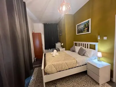Letto o letti in una camera di S Marcos Apartments