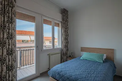 Letto o letti in una camera di La comodità del centro !