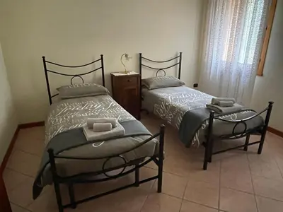 Letto o letti in una camera di Sole dei Colli