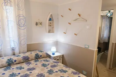Letto o letti in una camera di Appartamenti Vale Mare 2