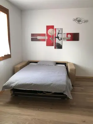 Letto o letti in una camera di Casa di Nancy Girasole a Valdobbiadene Unesco