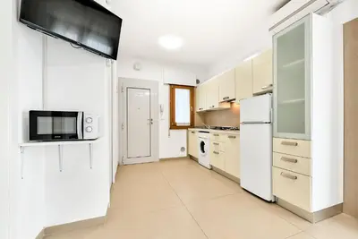 Cucina o angolo cottura di Jesolo Sun Beach House - Host Solution