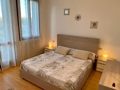 Letto o letti in una camera di Casa Vittoria