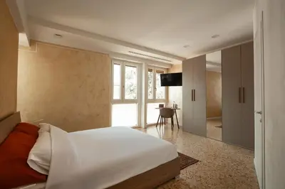 Letto o letti in una camera di T-Rooms