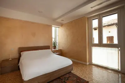 Letto o letti in una camera di T-Rooms