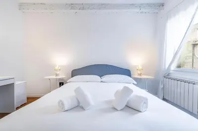 Letto o letti in una camera di Ca' del Sol