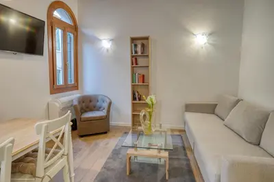 Area soggiorno di Ecco Suites Apartments