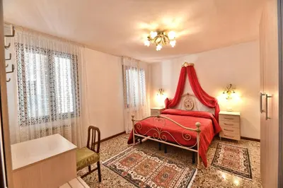 Letto o letti in una camera di Alla Corte Veneziana