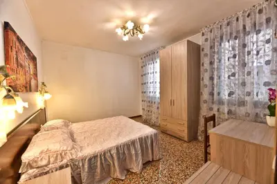 Letto o letti in una camera di Alla Corte Veneziana
