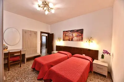 Letto o letti in una camera di Alla Corte Veneziana
