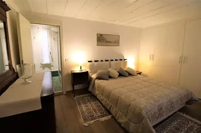 Letto o letti in una camera di San Marco charming apartment with canal view