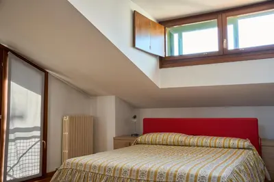 Letto o letti in una camera di Appartamento Olimpia-Centralissimo-Pochi passi dal mare