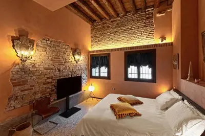Letto o letti in una camera di Ca'Ranieri Tenti (Design House)