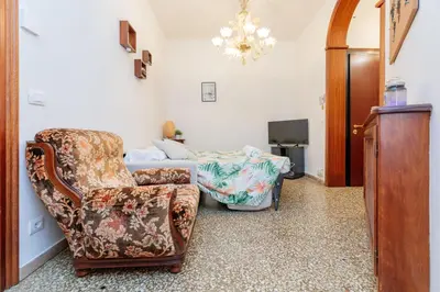 Area soggiorno di Tipica casa Veneziana a 15 minuti dal centro AC e fast WIFI