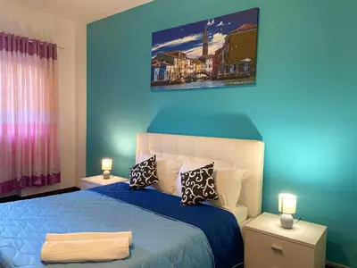 Letto o letti in una camera di Mestre Residence