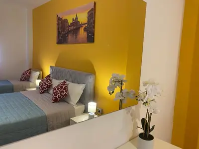 Letto o letti in una camera di Mestre Residence