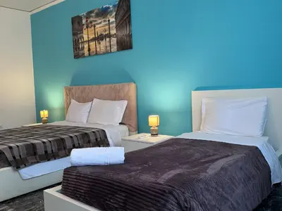 Letto o letti in una camera di Mestre Residence