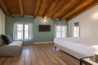 Letto o letti in una camera di Palazzina Riello
