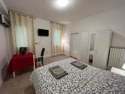 TV o dispositivi per l'intrattenimento presso Casa Roma rooms& apartmens